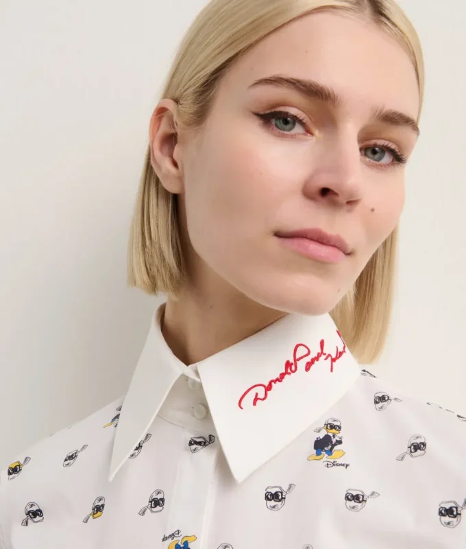 BLUSA CON ESTAMPADO INTEGRAL DISNEY X KL BLUSA CON ESTAMPADO INTEGRAL DISNEY X KL