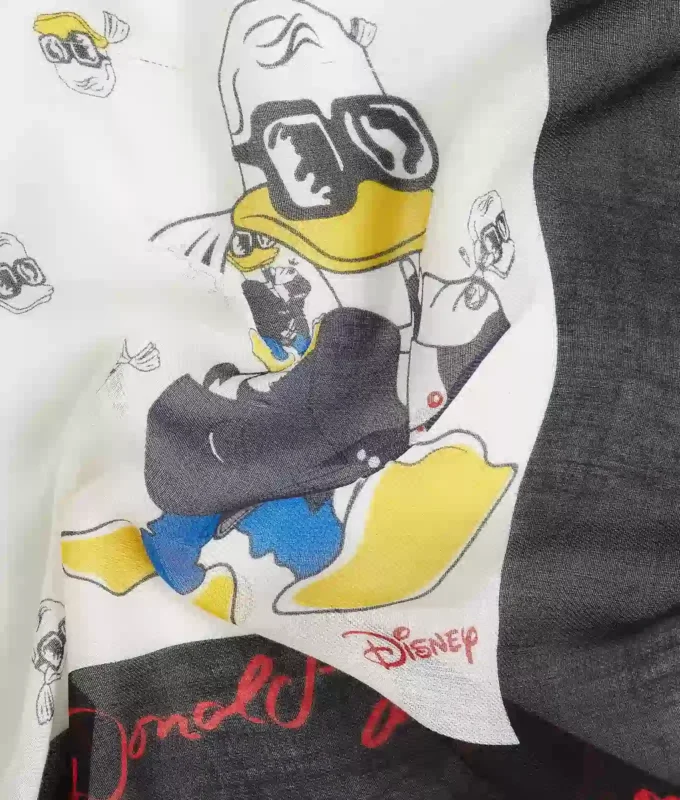 BUFANDA CON ESTAMPADO DISNEY X KL