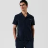 CAMISA DE TOALLA CON LOGOTIPO CAMISA DE TOALLA CON LOGOTIPO