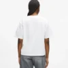 Camiseta con cuello en V y bajo característico Camiseta con cuello en V y bajo característico