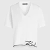 Camiseta con cuello en V y bajo característico Camiseta con cuello en V y bajo característico