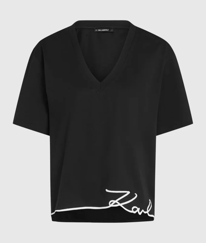 Camiseta con cuello en V y bajo característico Camiseta con cuello en V y bajo característico