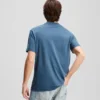 CAMISETA CON LOGOTIPO DE PARCHE CAMISETA CON LOGOTIPO DE PARCHE