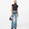 Camiseta con monograma y tachuelas Camiseta con monograma y tachuelas