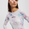 CAMISETA DE MALLA CON ESTAMPADO FLORAL CAMISETA DE MALLA CON ESTAMPADO FLORAL