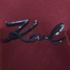 Camiseta Signature con lentejuelas