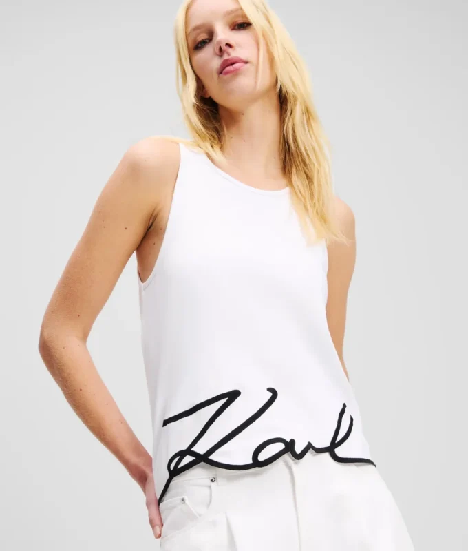 CAMISETA SIN MANGAS CON DOBLADILLA CARACTERÍSTICA CAMISETA SIN MANGAS CON DOBLADILLA CARACTERÍSTICA