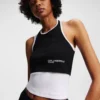 CAMISETA SIN MANGAS CON RIBETE EN CAPAS CAMISETA SIN MANGAS CON RIBETE EN CAPAS