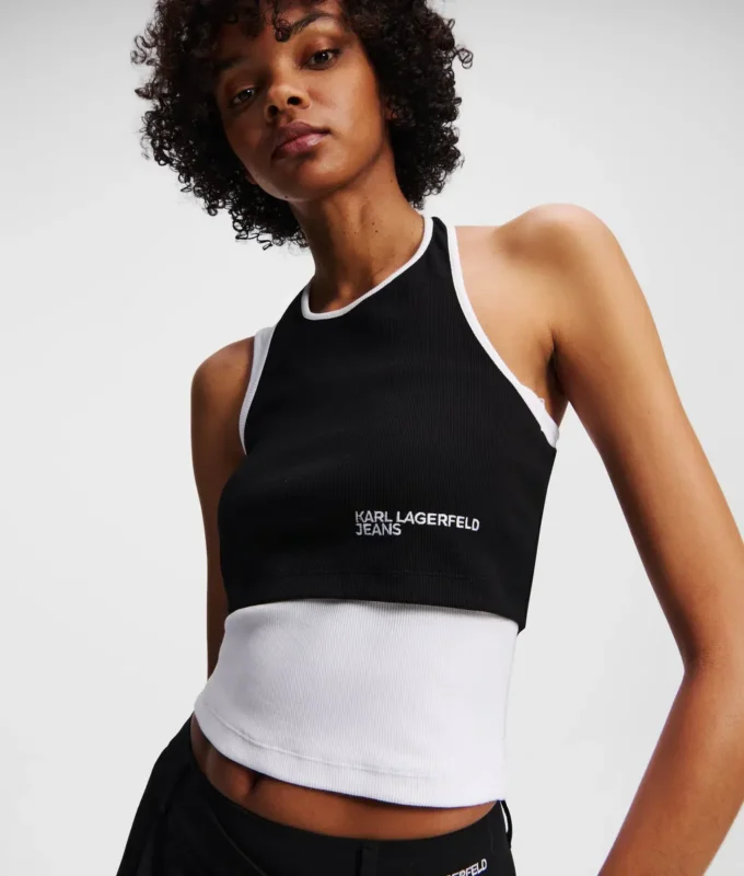 CAMISETA SIN MANGAS CON RIBETE EN CAPAS CAMISETA SIN MANGAS CON RIBETE EN CAPAS