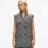 Chaleco de tweed con solapas de lentejuelas Chaleco de tweed con solapas de lentejuelas
