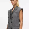 Chaleco de tweed con solapas de lentejuelas Chaleco de tweed con solapas de lentejuelas