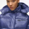 Chaqueta acolchada brillante y cuadrada Chaqueta acolchada brillante y cuadrada
