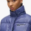 Chaqueta acolchada brillante y cuadrada Chaqueta acolchada brillante y cuadrada