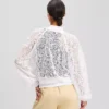 CHAQUETA BOMBER CON BORDADO DE ORQUÍDEAS CHAQUETA BOMBER CON BORDADO DE ORQUÍDEAS
