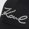 GORRA CON TACHAS K/SIGNATURE GORRA CON TACHAS K/SIGNATURE