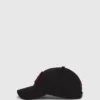 Gorra transformable con parches de pedrería Ikon