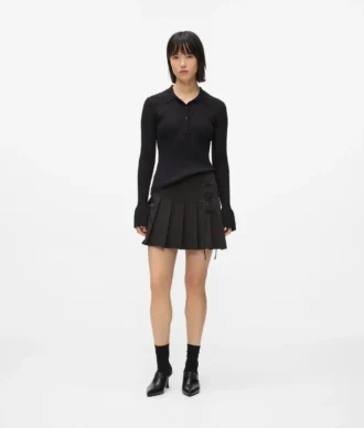 Minifalda plisada con detalle de lazo