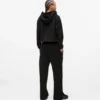 Pantalones de chándal con monograma y tachuelas Pantalones de chándal con monograma y tachuelas