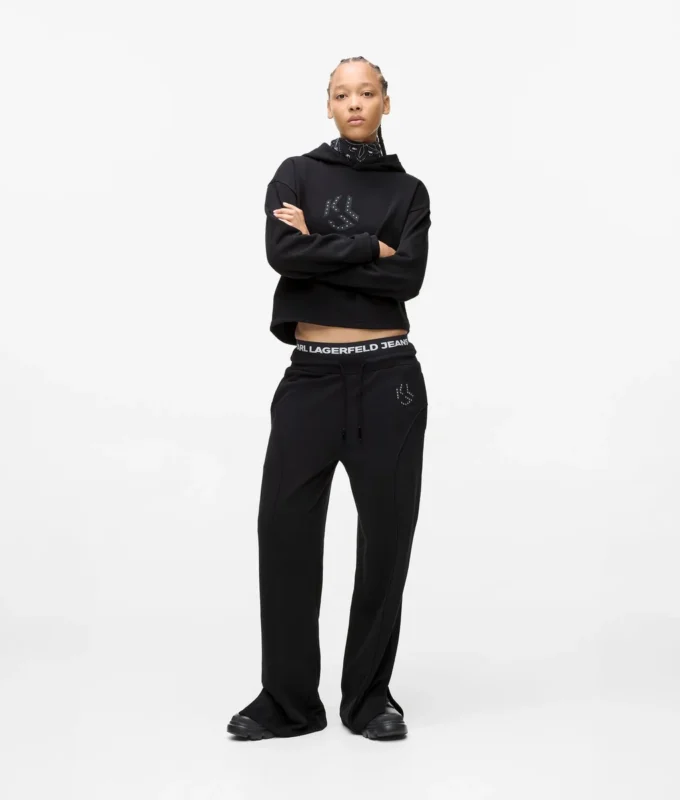 Pantalones de chándal con monograma y tachuelas Pantalones de chándal con monograma y tachuelas