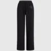 Pantalones de chándal con monograma y tachuelas Pantalones de chándal con monograma y tachuelas
