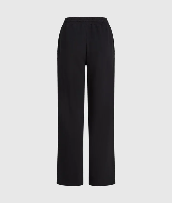 Pantalones de chándal con monograma y tachuelas Pantalones de chándal con monograma y tachuelas