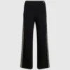 Pantalones de punto con detalles bouclé Pantalones de punto con detalles bouclé