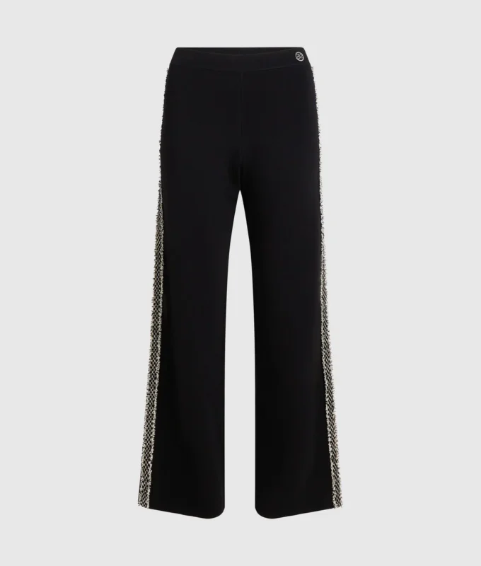 Pantalones de punto con detalles bouclé Pantalones de punto con detalles bouclé