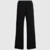 Pantalones de punto con detalles bouclé Pantalones de punto con detalles bouclé