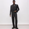 Pantalones KL Studio con detalles de satén Pantalones KL Studio con detalles de satén