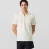 Polo con pin Monogram Polo con pin Monogram
