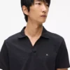 Polo con pin Monogram Polo con pin Monogram