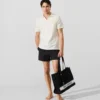 Polo con pin Monogram Polo con pin Monogram
