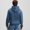 SUDADERA CON CAPUCHA Y LOGOTIPO DE PARCHE SUDADERA CON CAPUCHA Y LOGOTIPO DE PARCHE