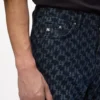 Vaqueros con estampado Monogram integral Vaqueros con estampado Monogram integral