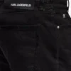 Vaqueros slim con detalles metálicos Vaqueros slim con detalles metálicos