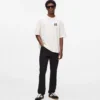 Vaqueros slim con detalles metálicos Vaqueros slim con detalles metálicos