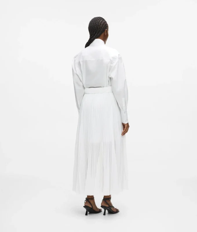 Vestido camisero con paneles plisados Vestido camisero con paneles plisados