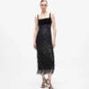 Vestido con flecos y lentejuelas Vestido con flecos y lentejuelas
