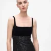 Vestido con flecos y lentejuelas Vestido con flecos y lentejuelas