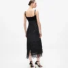 Vestido con flecos y lentejuelas Vestido con flecos y lentejuelas
