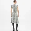 Vestido de punto con estampado de leopardo de las nieves Vestido de punto con estampado de leopardo de las nieves